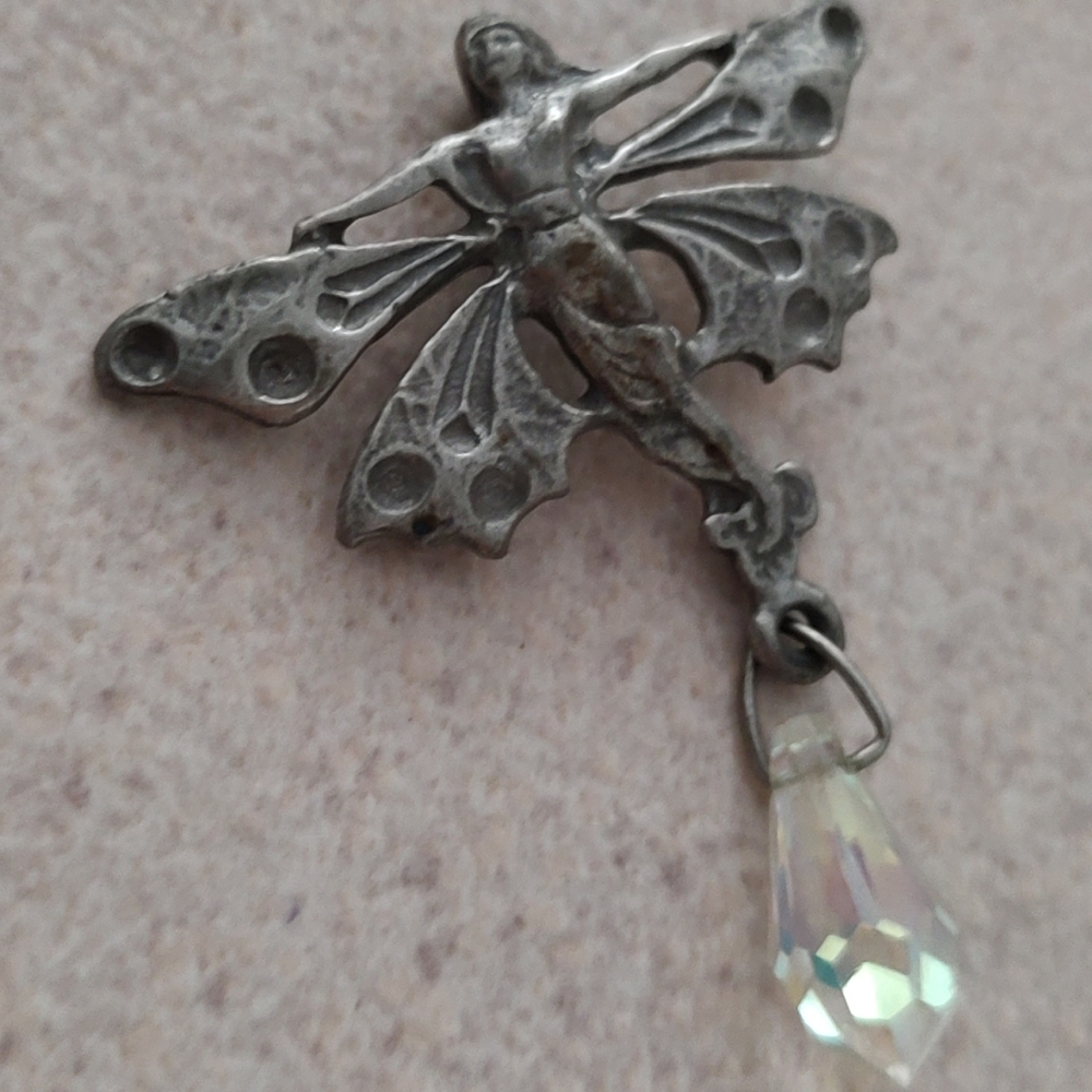 Beautiful pendant asymmetrical butterfly fairy nymph design with crystal drop